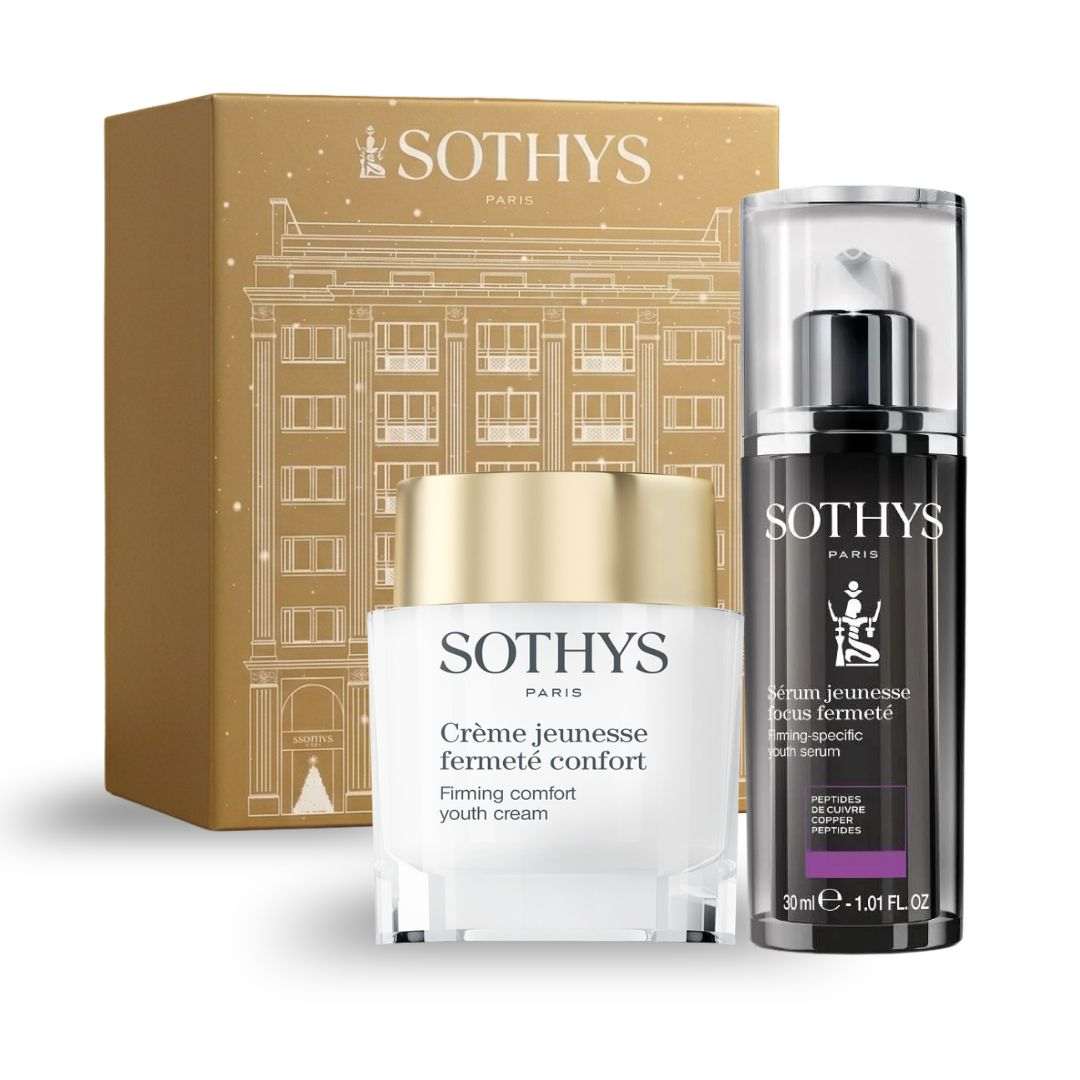 Coffret focus fermeté de soin Sothys, composé d’une crème en pot blanc et or et d’un sérum en flacon noir, avec boîte dorée décorée.