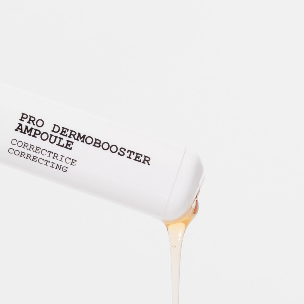 Pro Dermobooster Ampoules Correcting serum droplet on white background for acne-prone skin care