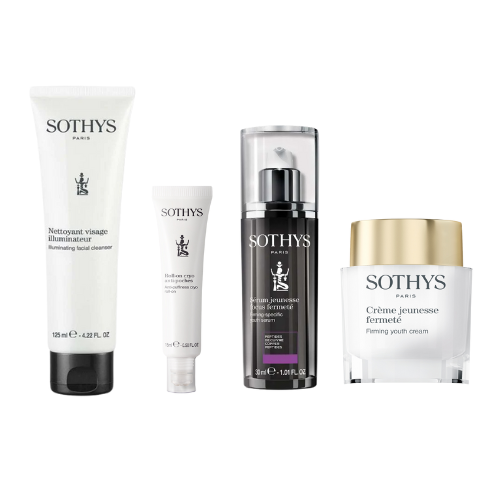 Routine fermeté / éclat skincare set with facial cleanser, anti-puffiness roll-on, firming serum, and youth cream.