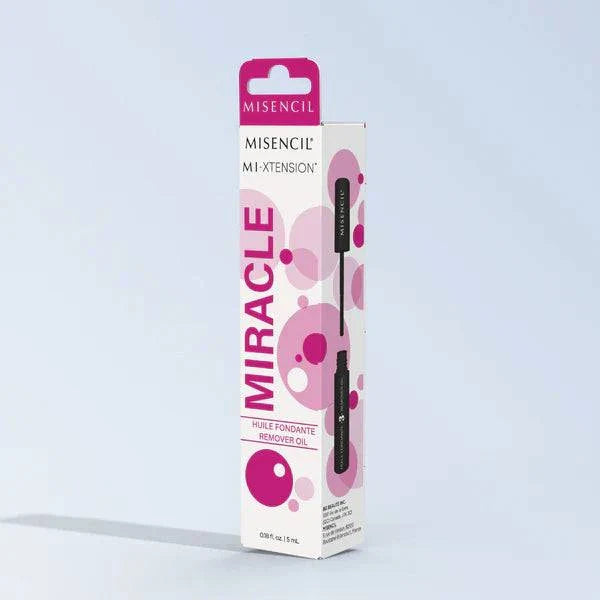 MI-XTENSION Huile fondante miracle remover oil packaging with pink design and branding.