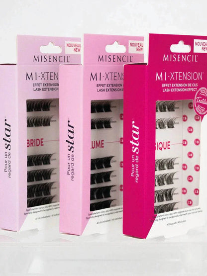 MI-XTENSION Boîtier de retouche eyelash kits on display, featuring synthetic quality lash extensions for home use.