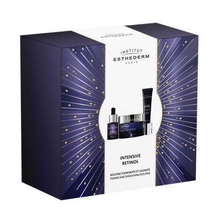 Institut Esthederm Intensive Retinol skincare gift set with cream, serum, and eye balm in decorative purple and gold packaging