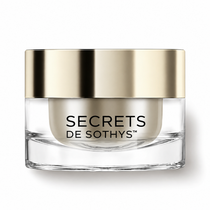 Crème Secret en pot rechargeable en verre transparent, avec couvercle doré et logo Secrets de Sothys.