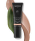 Teint Detox énergie Sublimateur de peau cosmetic tube on textured background.