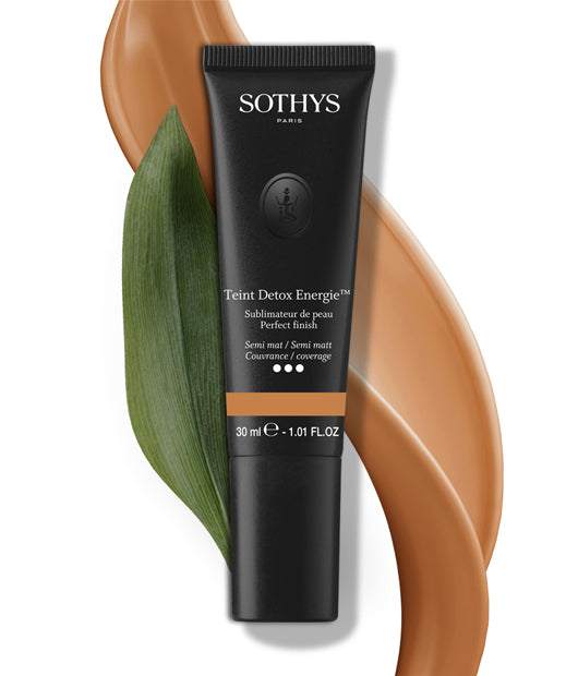 Sothys Teint Detox Énergie W20 Miel fluid foundation tube with honey shade and green leaf background